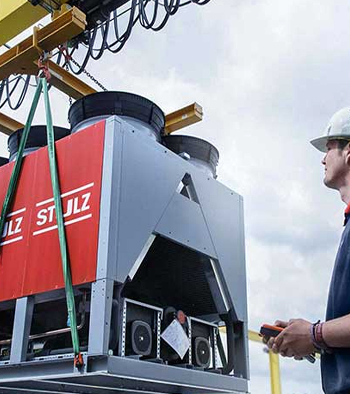 STULZ technician installing cooling system