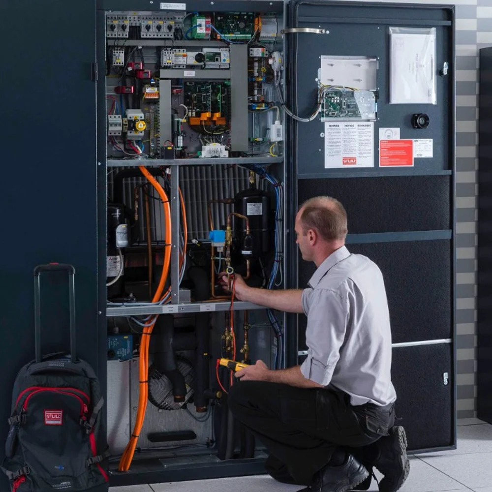 STULZ technician conducting a site equipment audit.