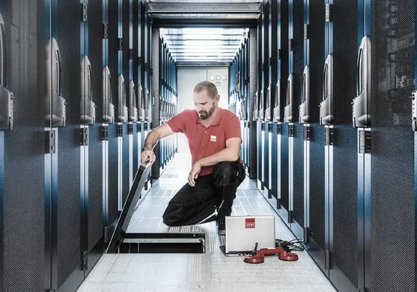 STULZ technician performing a site equipment audit.